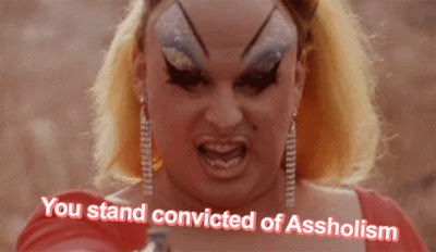 This meme features a photo of RuPaul, a famous drag queen and TV personality, with a shocked expression. The text "You're a woman, now go on with your bad self!" is not in the image, but the image is of RuPaul with a shocked expression and the text "You stand convicted of" is in the image.